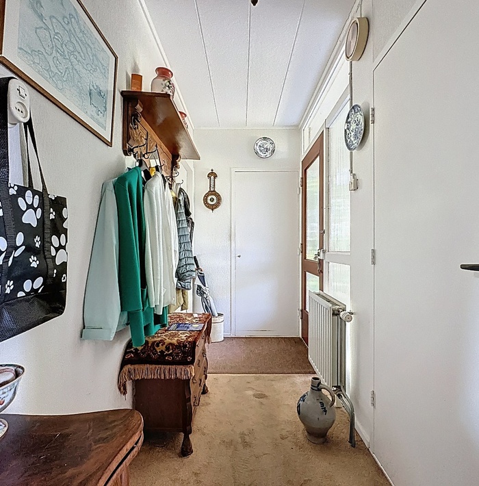 bungalowmetapartegarageenschuurtjeopeenbetoverendperceel.006.jpg