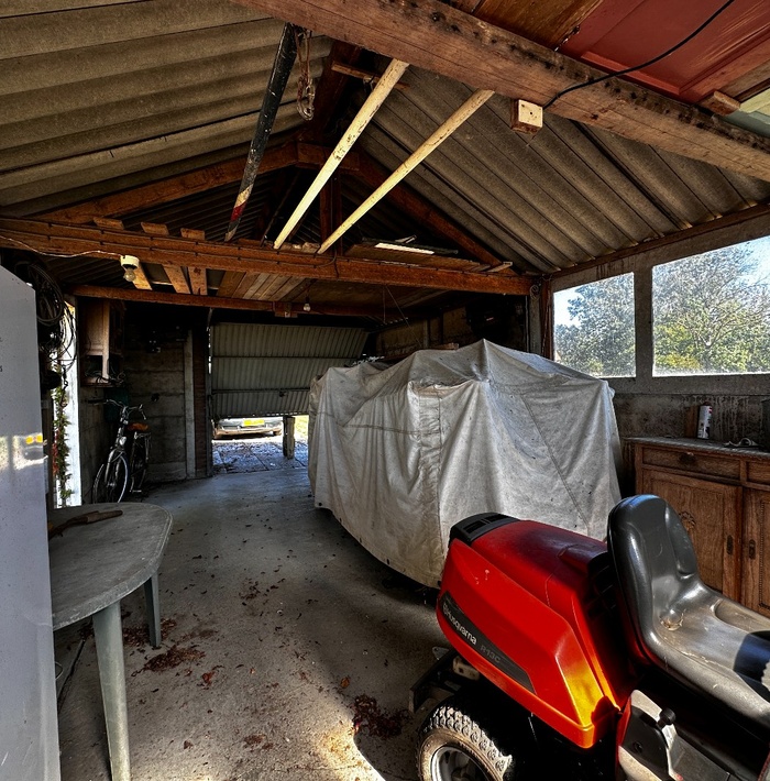 bungalowmetapartegarageenschuurtjeopeenbetoverendperceel.013.jpg